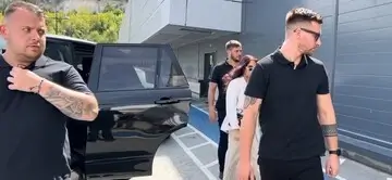 Group of executive close protection officers in live training session.